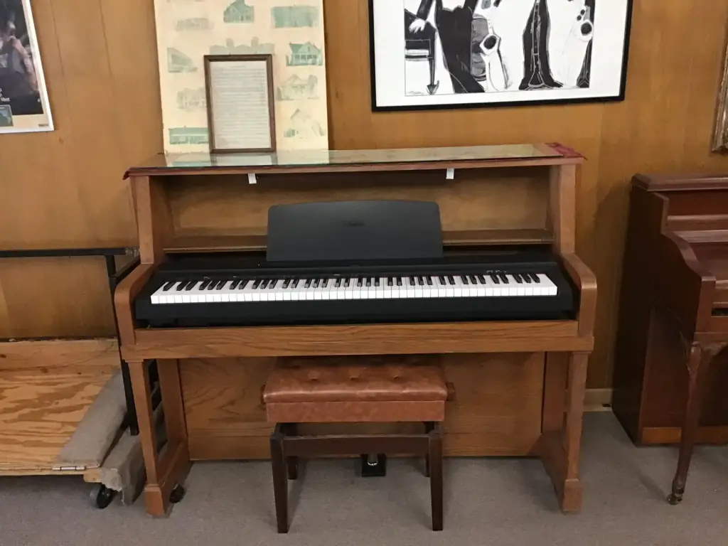 Everett studio piano cabinet rebuilt around a modern Yamaha P-125a digital keyboard